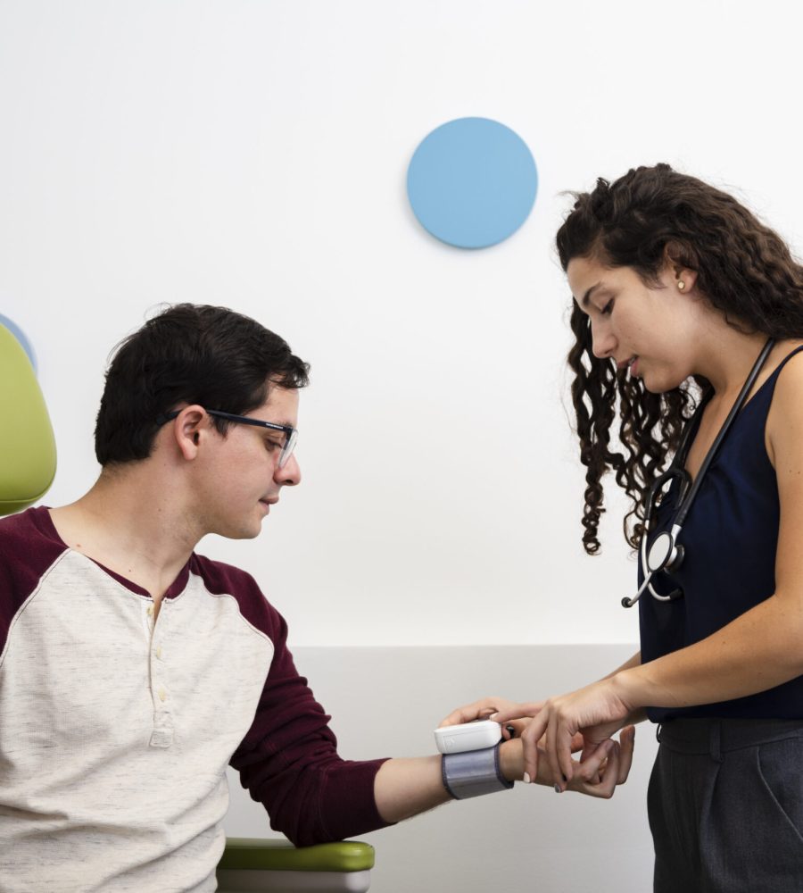 side-view-doctor-checking-blood-pressure side-view-doctor-checking-blood-pressure
